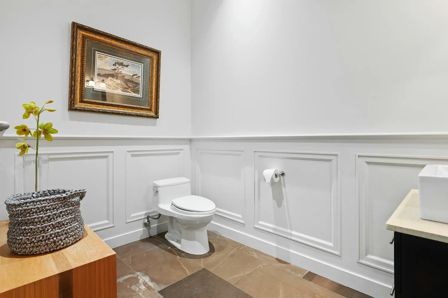 Bathroom wainscoting with picture frame molding installed in a Southeast Wisconsin home
